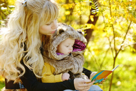 mother reading for baby sonの写真素材