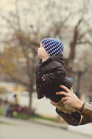 father holding his baby sonの写真素材