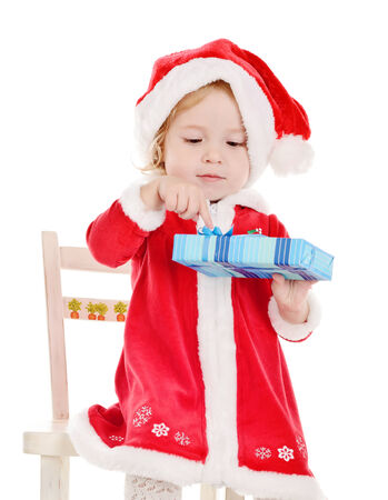 little Santa girl with presentの写真素材