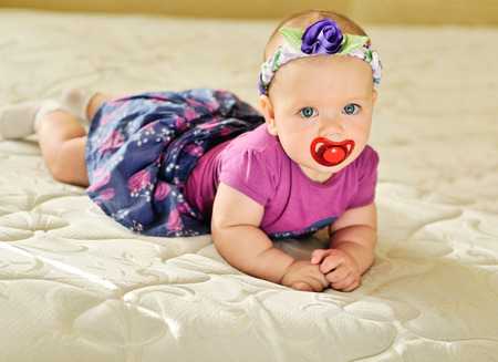 fashion baby girl with tears in eyesの写真素材