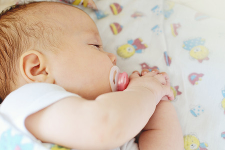 close up of sleeping newbornの写真素材