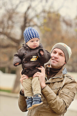 father holding his baby sonの写真素材