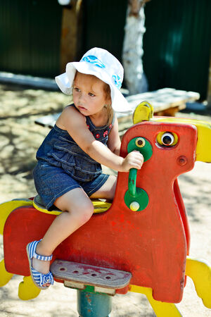 cute and fashion girl on the playgroundの写真素材