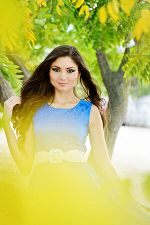 pretty girl wearing blue dressの写真素材