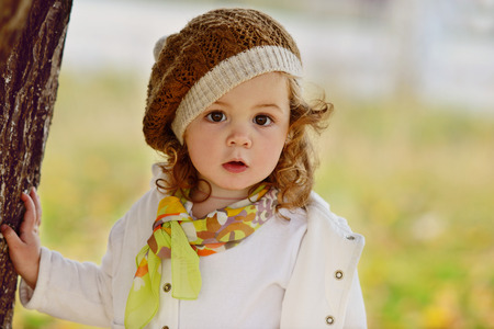 cute baby girl in fall timeの写真素材