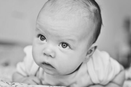 little baby trying to  keep head