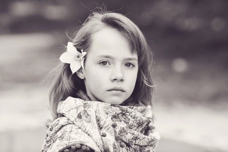 portrait of blonde girl outdoors in spring timeの写真素材