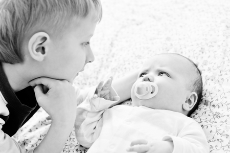 brother glad to see his baby sister