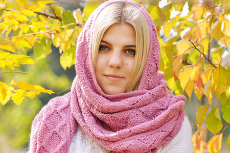teen blonde girl in the fall timeの写真素材