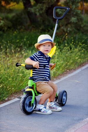 first bike for toddler boy in the parkの写真素材