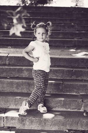 fashion little girl on the walk in summerの写真素材