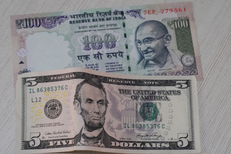 Indian rupees and US dollarsの写真素材