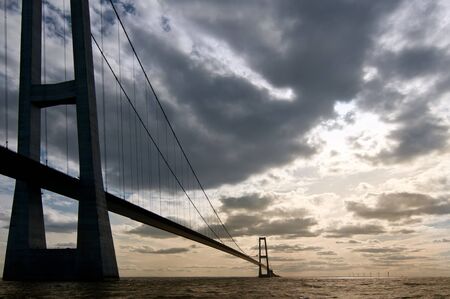 Suspension bridge with light clouds indの写真素材