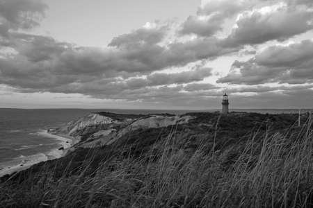 Lighthouse and red cliffs at Martha's Vineyardの写真素材