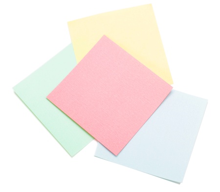 Colored sticky notes isolated on white
