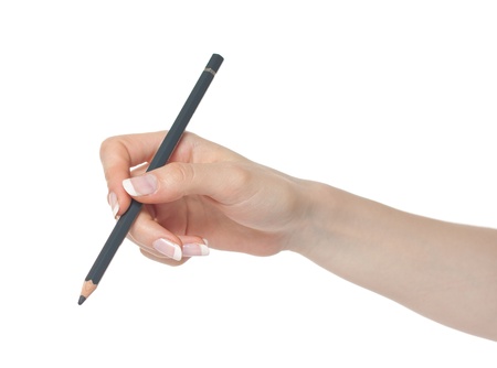 Woman hand holding pencil before writingの写真素材