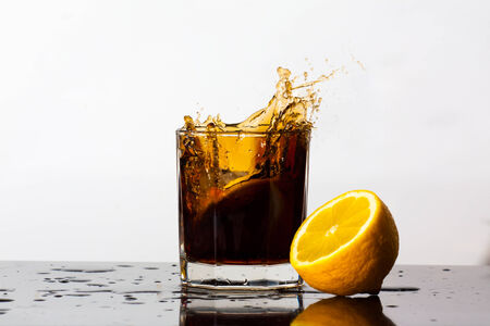 Splashing drink of Cola