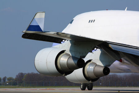 Detail of huge cargo plane wing and engine