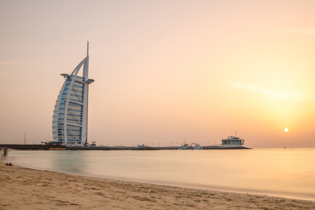 DUBAI, UAE - APRIL 1, 2015 : Burj Al Arab, One of the most famous landmark of United Arab Emirates. Picture taken during sunset on April 1, 2015.のeditorial素材