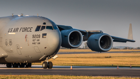 PRAGUE - SEPTEMBER 13: U.S. Air Force C-17 Globmaster stand at PRG Airport on September 13, 2018 in Prague, Czech Republic. Boeing C-17 Globemaster III is a large military transport aircraft.のeditorial素材