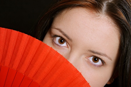 young women with fanの写真素材