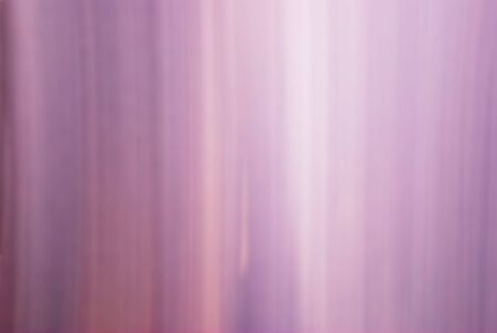 pink and purple steel plate reflecting lightの写真素材