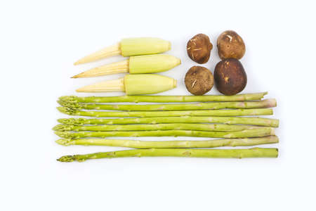 Fresh green asparagus ,mushrooms ,corn  isolated on whiteの写真素材