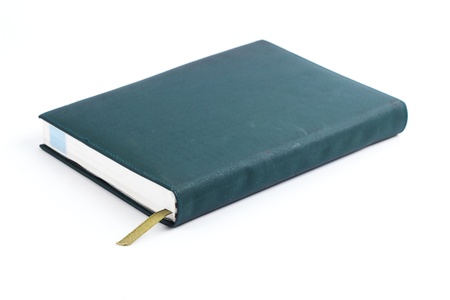 Old green leather notebook isolated on whiteの写真素材