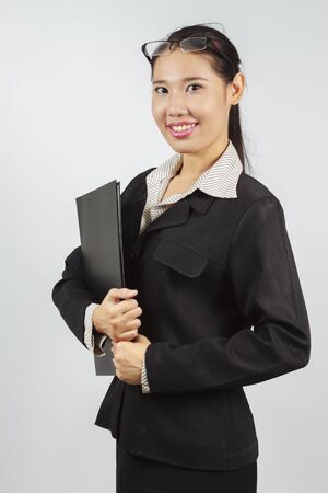 Business Women holding file の写真素材