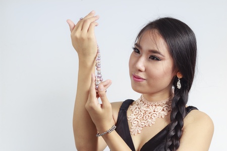 Beautiful Asian woman with pearl jewelleryの写真素材