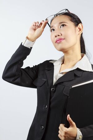 Business Women holding fileの写真素材