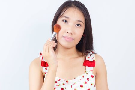 Portrait of Asian women attractive applying blusherの写真素材