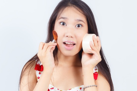 Portrait of Asian women attractive applying blusherの写真素材
