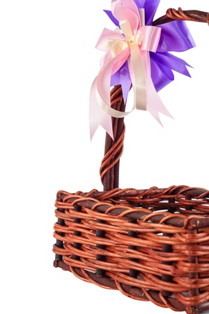 basket with ribbon isolated on white backgroundの写真素材