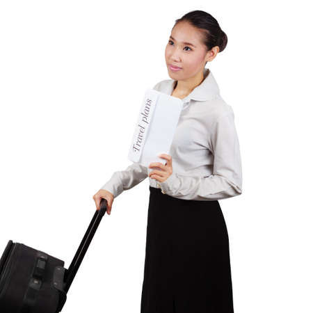 Business Asian woman with a suitcase isolated on white background.の写真素材