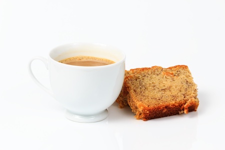 coffee and banana bread isolated on white backgroundの写真素材