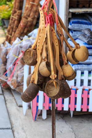 Dipper made from coconut shell, traditional container for drinking water of Thai peopleの写真素材