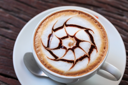 coffee cup on wood backgroundの写真素材