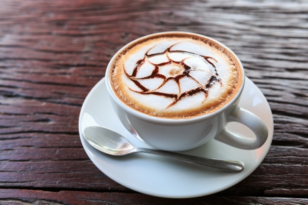 coffee cup on wood backgroundの写真素材