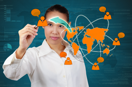 Businesswoman showing succes of communication on virtual screen. Concept of marketing growth.の写真素材
