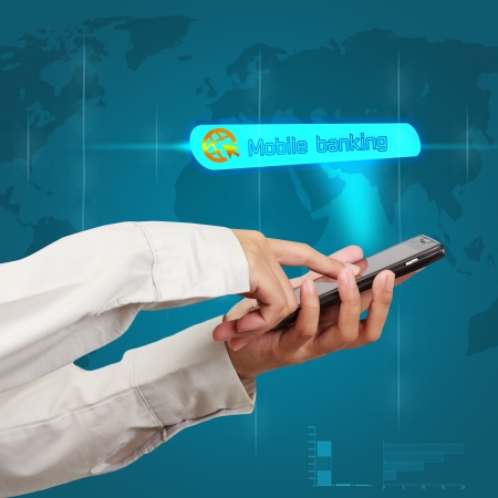 Modern mobile phone in a  businessman hand. online transaction concept mobile bankingの写真素材