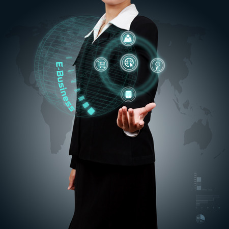 Businessman showing e-business concept on virtual screen.の写真素材