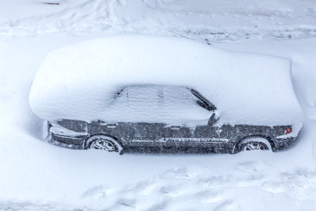 gray car after abundant snowfall