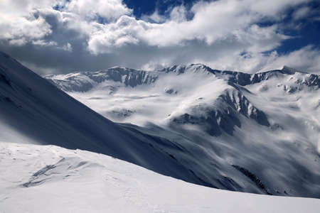 Winter mountains in the clouds. Caucasus Mountains, Georgia, region Gudauri.