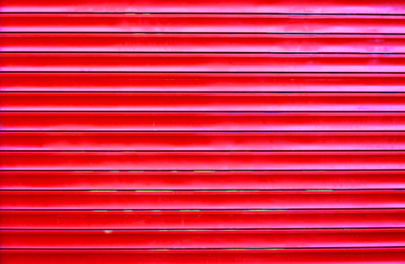 red plastic blinds, closeup of photoの写真素材
