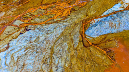 Aerial drone image of the nature pollution and water contamination of the copper mine exploitation...