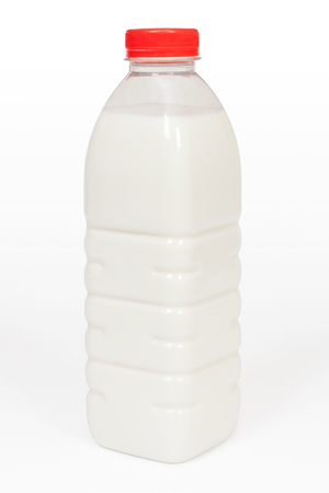 The photo of a bottle of milk on a white background の写真素材
