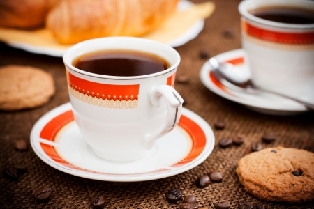 Photo with the image of a cup of coffee and confectionery products の写真素材