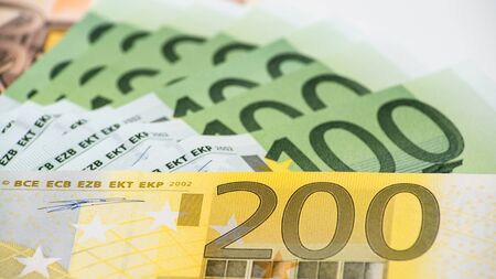 Euros bills of different values. A euro bill of two hundred. Cash money background. Real banknotes hundred. Good earnings. Issuing the salary. Credit percentの写真素材