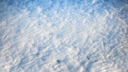 Wonderful view of cloudscape with clear blue sky from above. Beautiful panorama above white clouds...